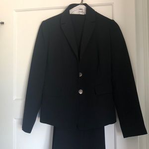 Calvin Klein dark blue business suit.